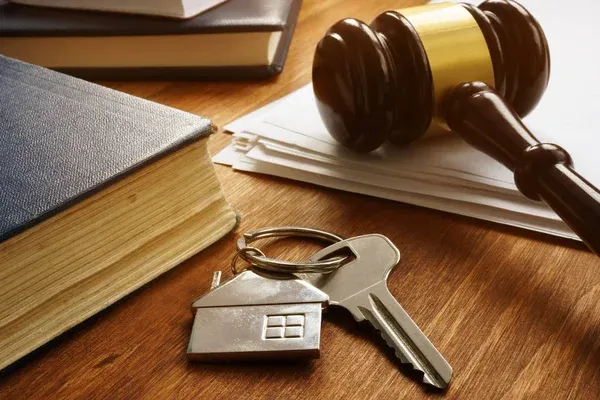 depositphotos_318557316-stock-photo-property-law-concept-key-from